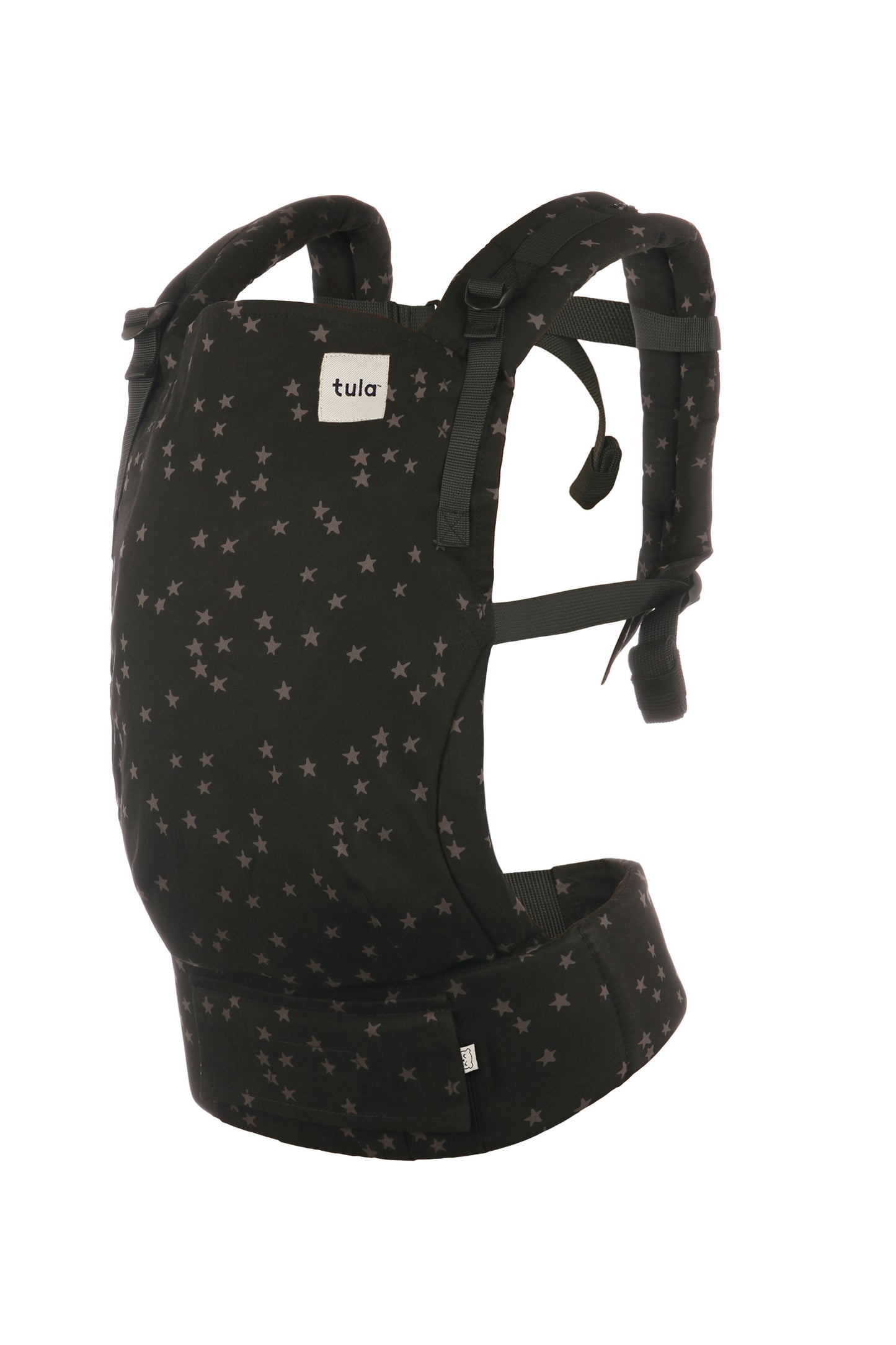 Nosidełko Tula Free-to-Grow Discover z szarymi gwiazdkami na czarnym tle pokrywającymi całe nosidełko oraz kapturek.