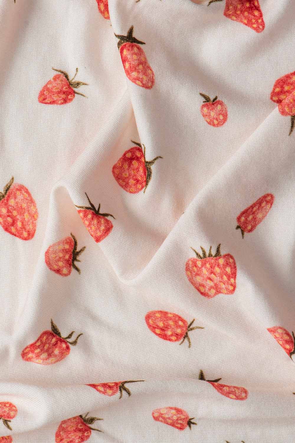 Zbliżenie na materiał Otulacza Tula Stawberry